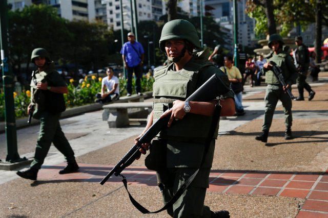 National Guards patrol at Altamira square in Caracas