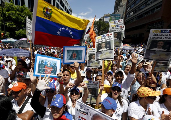 Opposition supporters shout during a rally against Venezuela's President Nicolas Maduro's government and in support of the political leaders in prison, in Caracas