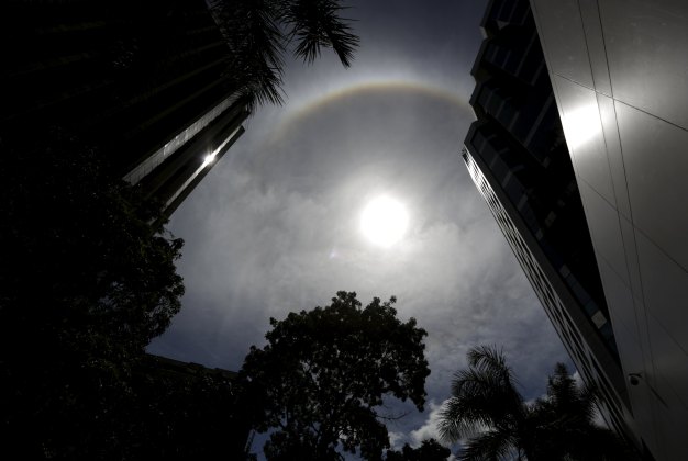 A solar halo is seen in the sky over Caracas