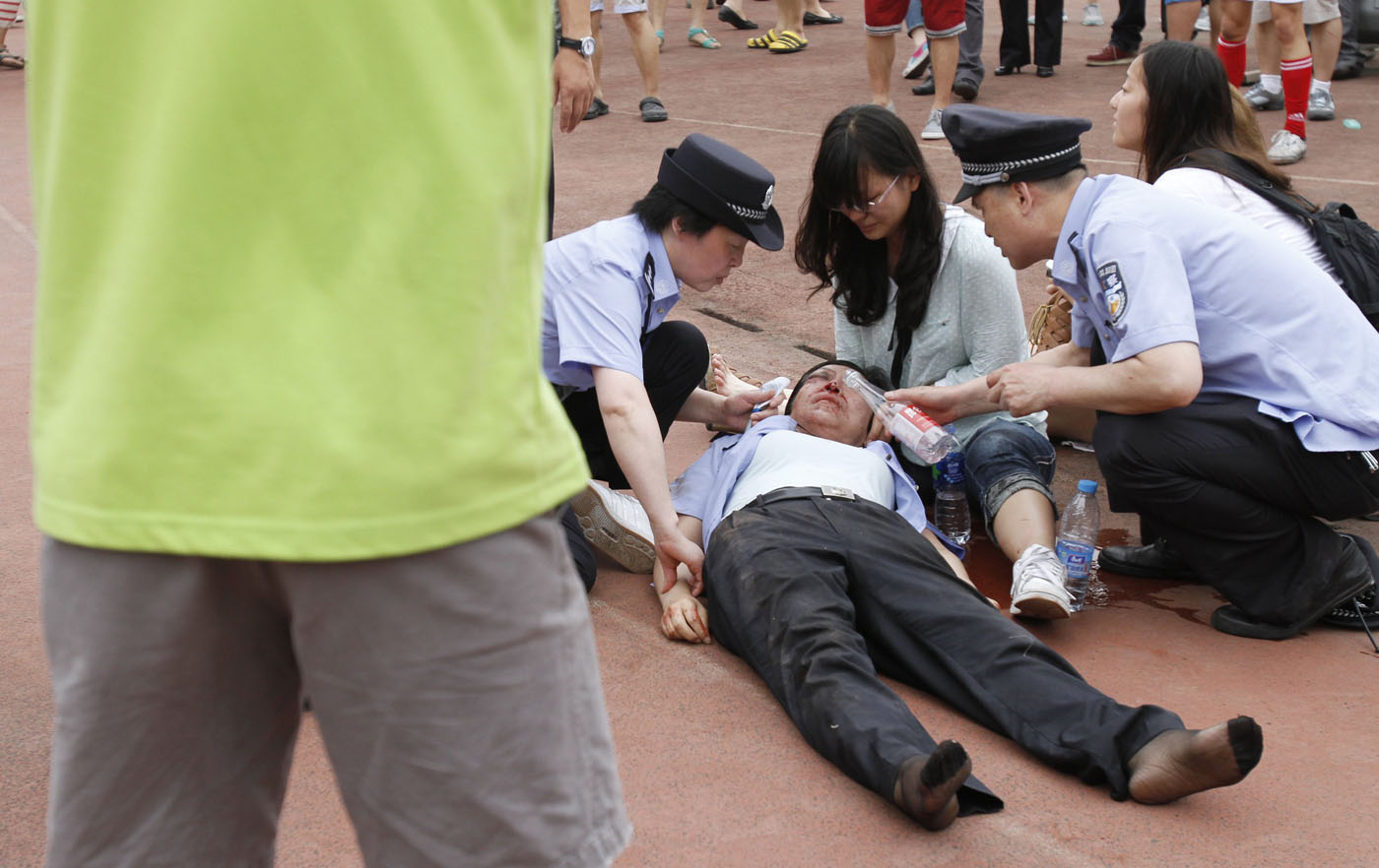 Siete heridos por estampida en un acto de David Beckham en China (Fotos)