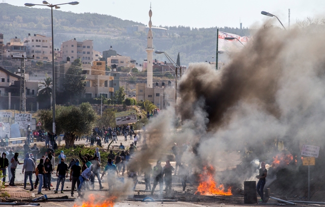 Fotos: Disturbios en un pueblo árabe israelí, tras muerte de un palestino a manos de la policía