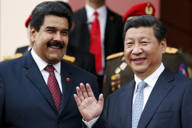 File photo of China's President Xi attending meeting with Venezuela's President Nicolas Maduro at Miraflores Palace in Caracas