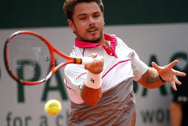 ¡Todo un duelo de titanes!  Wawrinka derrotó a Roger Federer (FOTOS)