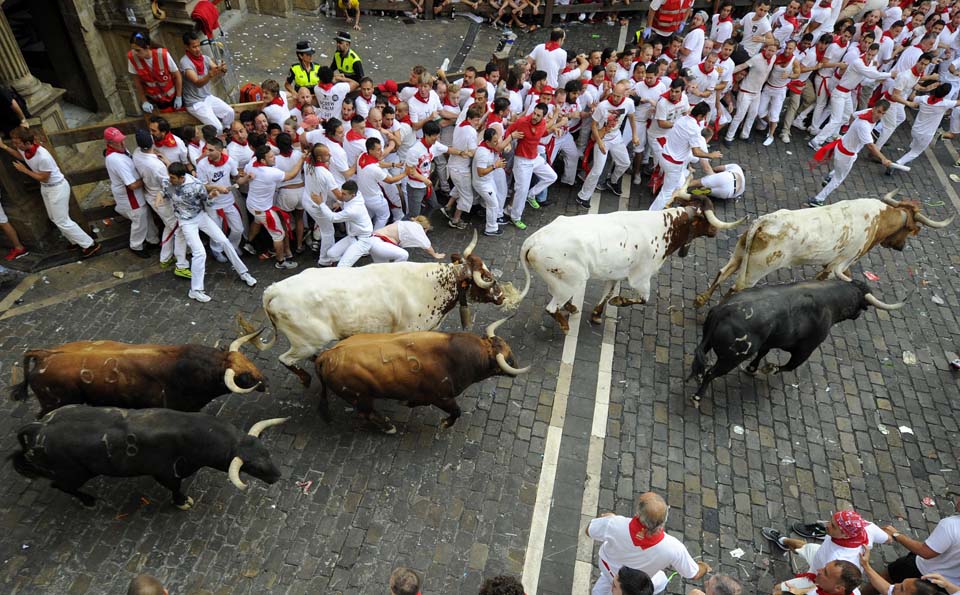 Al menos tres personas corneadas en el primer encierro de San Fermín en España (Fotos)