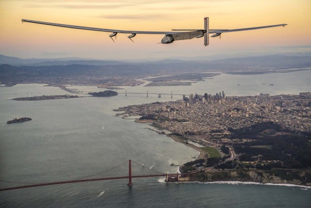 "Solar Impulse 2", a solar-powered plane piloted by Bertrand Piccard of Switzerland, flies over the Golden Gate bridge in San Francisco, California, U.S. April 23, 2016, before landing on Moffett Airfield following a 62-hour flight from Hawaii.  Jean Revillard/Solar Impulse/Handout via REUTERS   ATTENTION EDITORS - THIS IMAGE WAS PROVIDED BY A THIRD PARTY. EDITORIAL USE ONLY.
