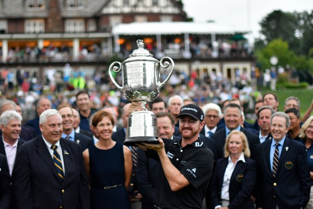 Jul 31, 2016; Springfield, NJ, USA; Jimmy Walker holds up the Wanamaker trophy during the Sunday round of the 2016 PGA Championship golf tournament at Baltusrol GC - Lower Course. Mandatory Credit: Eric Sucar-USA TODAY Sports