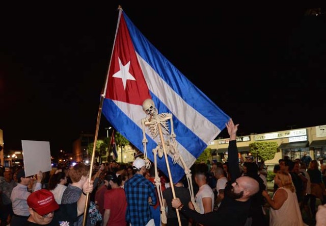 MIAMI, FL - NOVEMBER 26: Miami residents celebrate the death of Fidel Castro on November 26, 2016 in Miami, Florida. Cuba's current President and younger brother of Fidel, Raul Castro, announced in a brief TV appearance that Fidel Castro had died at 22:29 hours on November 25 aged 90. Gustavo Caballero/Getty Images/AFP