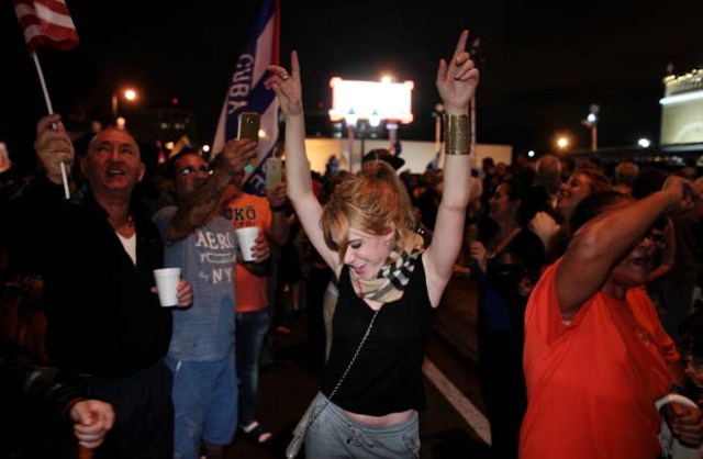 People celebrate after the announcement of the death of Cuban revolutionary leader Fidel Castro in the Little Havana district of Miami, Florida, U.S. November 26, 2016. REUTERS/Javier Galeano