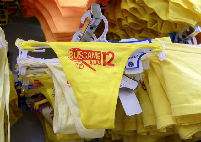 View of yellow underwear for sell at a store in Medellin, Colombia, on December 29, 2016, where tradition holds that it brings prosperity and good luck if you wear it on New Year's Eve. / AFP PHOTO / CAMILO GIL
