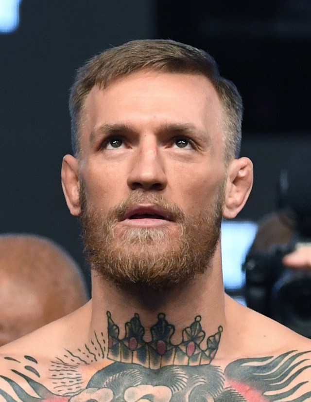 LAS VEGAS, NV - AUGUST 25: UFC lightweight champion Conor McGregor stands on the scale during his official weigh-in at T-Mobile Arena on August 25, 2017 in Las Vegas, Nevada. McGregor will meet boxer Floyd Mayweather Jr. in a super welterweight boxing match at T-Mobile Arena on August 26. Ethan Miller/Getty Images/AFP