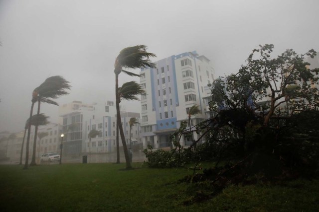 Heavy wind is seen along Ocean Drive in South Beach as Hurricane Irma arrives at south Florida, in Miami Beach, Florida, U.S., September 10, 2017. REUTERS/Carlos Barria