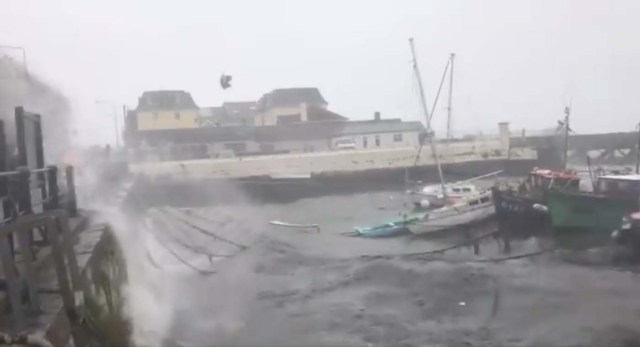 Winds batter the harbour as storm Ophelia hits Cork, Ireland, October 16, 2017, in this still images obtained from social media video. KIERON O'CONNOR/ via REUTERS THIS IMAGE HAS BEEN SUPPLIED BY A THIRD PARTY. MANDATORY CREDIT. NO RESALES. NO ARCHIVES.