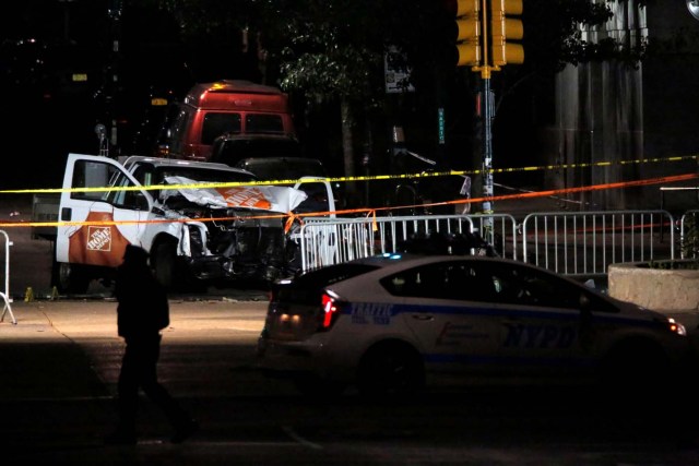 The pickup truck used in an attack on the West Side Highway sits behind police tape in Manhattan, New York, U.S., November 1, 2017. REUTERS/Andrew Kelly