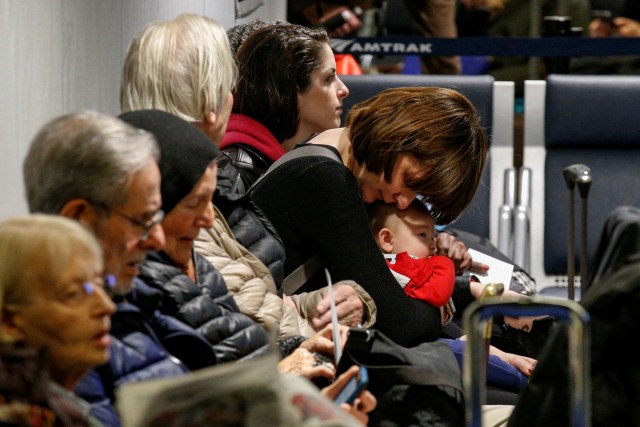 Passengers wait for Amtrak trains to be called, ahead of the Thanksgiving Day holiday, at Pennsylvania Station in New York City, U.S., November 22, 2017. REUTERS/Brendan McDermid