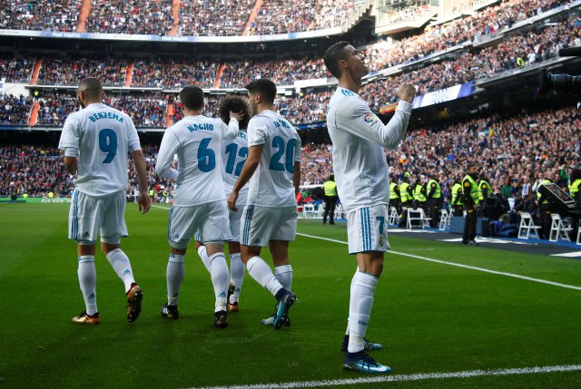 Soccer Football - La Liga Santander - Real Madrid vs Sevilla - Santiago Bernabeu, Madrid, Spain - December 9, 2017 Real Madrid’s Cristiano Ronaldo celebrates scoring their second goal REUTERS/Javier Barbancho