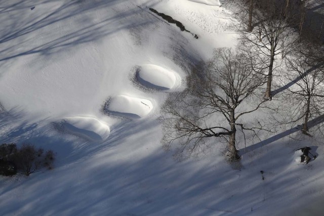 WHITE PLAINS, NY - JANUARY 05: Golf course sand traps sit covered in snow on January 5, 2018 near White Plains, United States. New York dug out from the "Bomb Cyclone" under frigid temperatures. John Moore/Getty Images/AFP