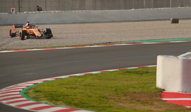 F1 Formula One - Formula One Test Session - Circuit de Barcelona Catalunya, Montmelo, Spain - February 26, 2018 Fernando Alonso of McLaren crashes out after losing a rear tyre during testing REUTERS/Albert Gea