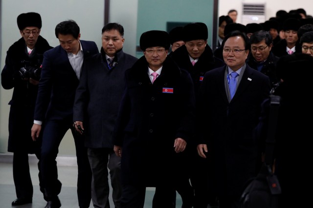 A North Korean delegation of 32 people, including 10 athletes of North Korean Olympic team, arrives at Yangyang international airport in Gangwon province, South Korea, February 1, 2018. REUTERS/Jeon Heon-Kyun/Pool