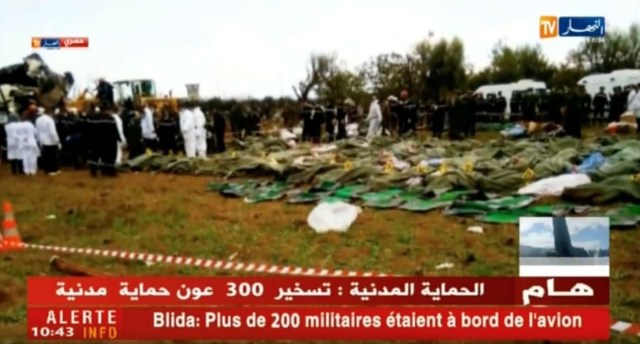 Bodies are seen on the ground after a plane crashed into a field outside Algiers, Algeria April 11, 2018 in this still image taken from a video. ENNAHAR TV/Handout/ via REUTERS  THIS IMAGE HAS BEEN SUPPLIED BY A THIRD PARTY. ALGERIA OUT. NO COMMERCIAL OR EDITORIAL SALES IN ALGERIA. NO RESALES. NO ARCHIVES.