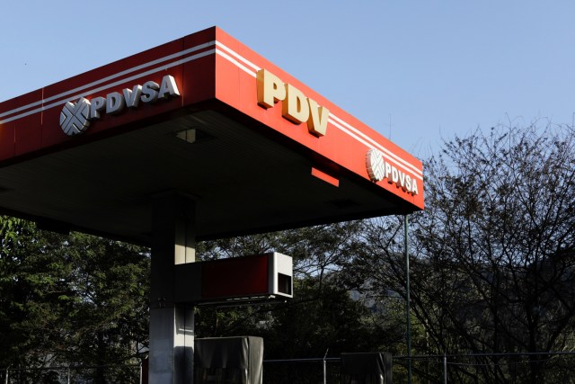 The corporate logo of the state oil company PDVSA is seen at a gas station in Caracas, Venezuela March 18, 2018. Picture taken March 18, 2018. REUTERS/Marco Bello