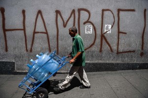 Trabajadores venezolanos celebran su día con salario de hambre