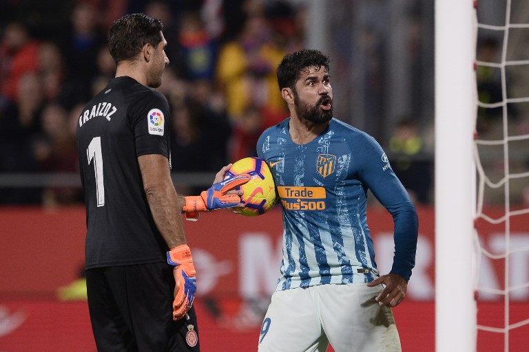 El empuje de Diego Costa salva un punto para el Atlético en Girona