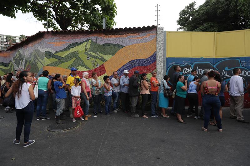 ¡Fascismo puro! Colectivos chavistas amedrentaron con disparos entrega de ayuda en el 23 de enero (Video)