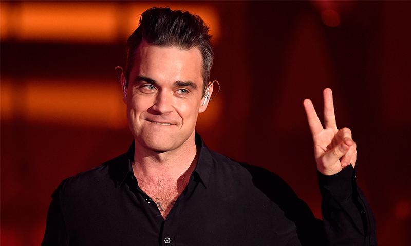 Durante sus vacaciones: Robbie Williams se contagió de coronavirus en una isla del Caribe
