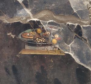 Descubren la representación de un posible antepasado de la pizza en un fresco en Pompeya